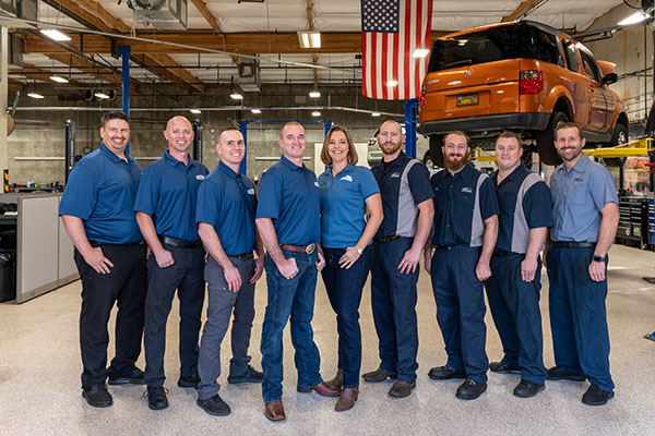 Technician working on vehicle